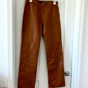 Caramel color leather pants.